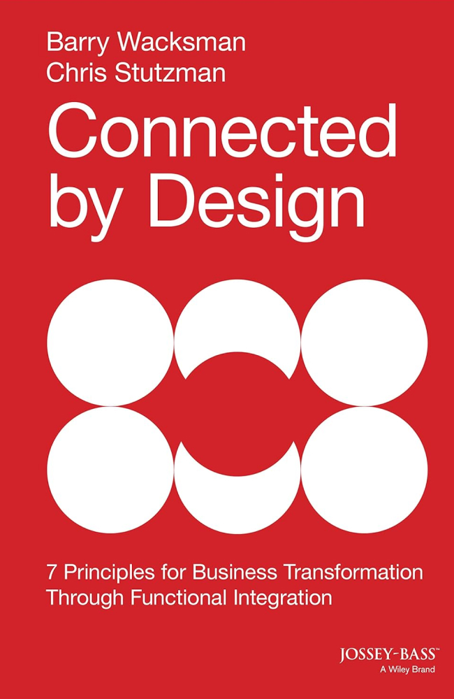 A red book cover with 6 white circles in a 2 x 3 grid and large typography.