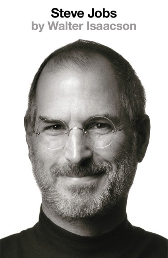 A book cover containing a black and white photo of Steve Jobs.